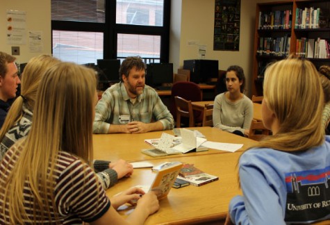 Students gather around Jeffrey Brown to learn about graphic novels at Literary Festival on Nov. 14 