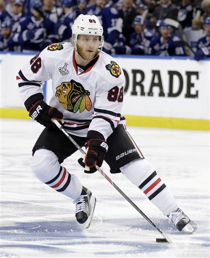 FILE - In this June 6, 2015, file photo, Chicago Blackhawks right wing Patrick Kane skates against the Tampa Bay Lightning during the second period in Game 2 of the NHL hockey Stanley Cup Final in Tampa, Fla. The NHL says it is following developments of a police investigation involving Chicago Blackhawks star Patrick Kane, Thursday, Aug. 6, 2015. (AP Photo/Chris OMeara, File)