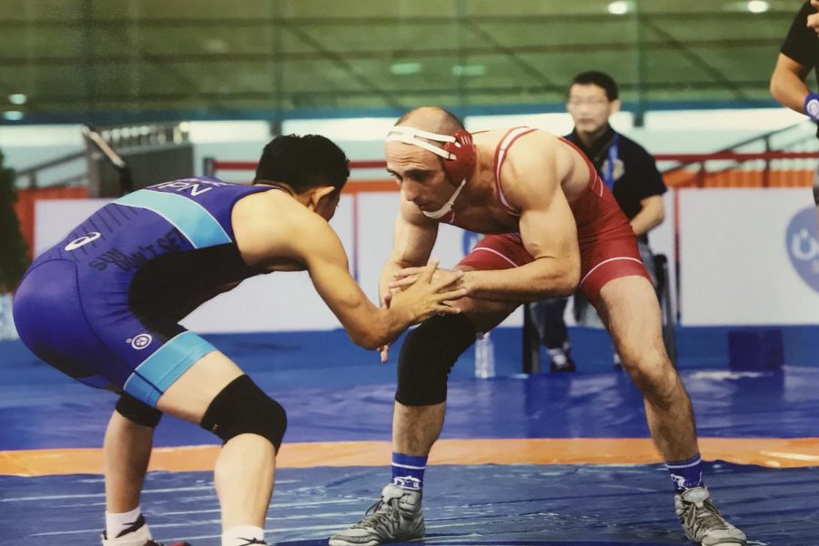 Coach Tadelman wrestling at the world championships    | Tadelman