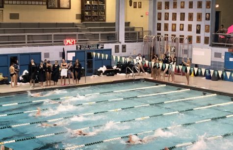 Trevian and Rambler swimmers compete in the varsity 200-meter freestyle relay at the Sept. 20 meet