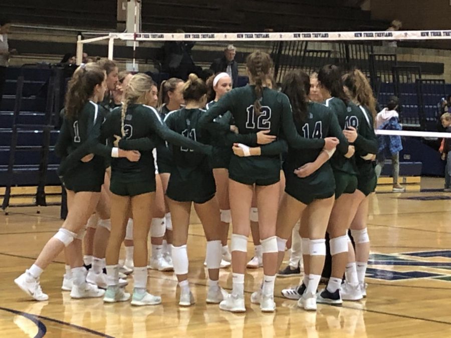 The team huddles before their game with Maine South on Oct. 2