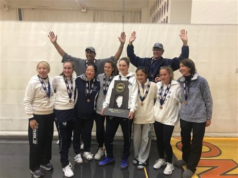 The team celebrates after state on Oct. 26 