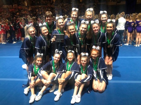 Cheer team poses following the ICCA championship