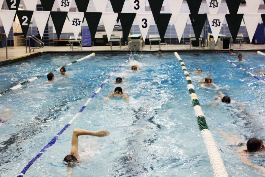 Members of the team during a practice after the Evanston meet, they will soon begin preparing for state