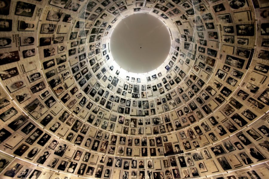 PhotosofHolocaustvictimsframetheceilingoftheHallofNamesatYadVashem,theHolocaustMuseuminJerusalem. It is a memorial to each and every Jew who perished in the Holocaust