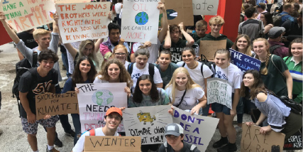 Students gathered downtown Friday in efforts to put pressure on lawmakers for climate reform  