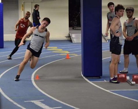 Junior Ben Yoder running at a New Trier open meet this season