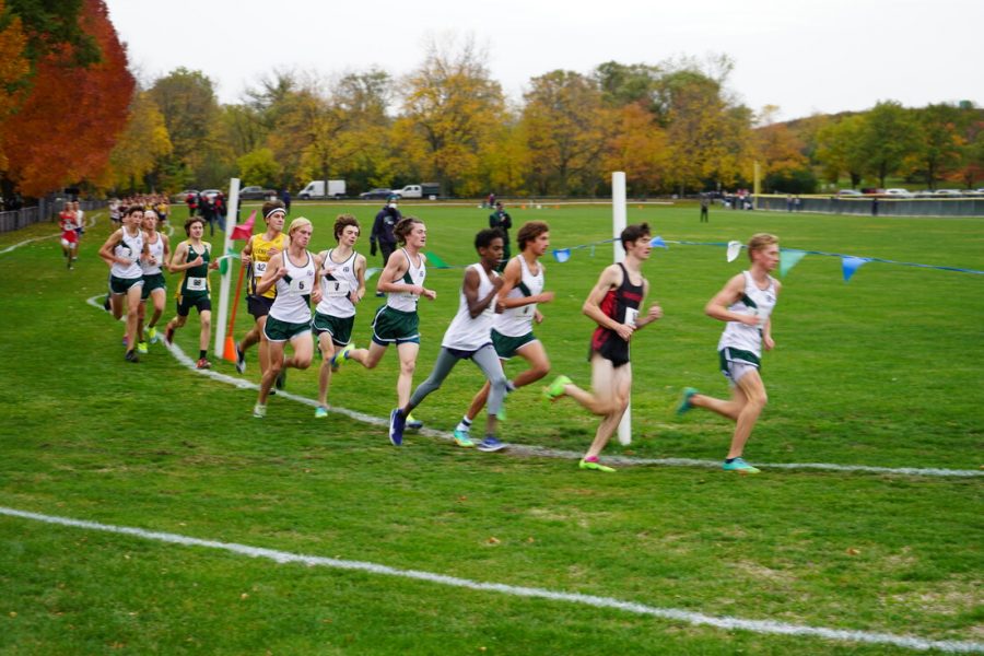 The varsity team runs the three-mile race at Duke Childs Fields on Oct. 17. The JV team was unable to compete because they were quarantining after a positive test result