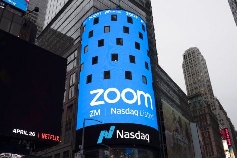 A sign for Zoom Video Communications appears on a Times Square billboard before the company’s IPO on the Nasdaq in April 2019
