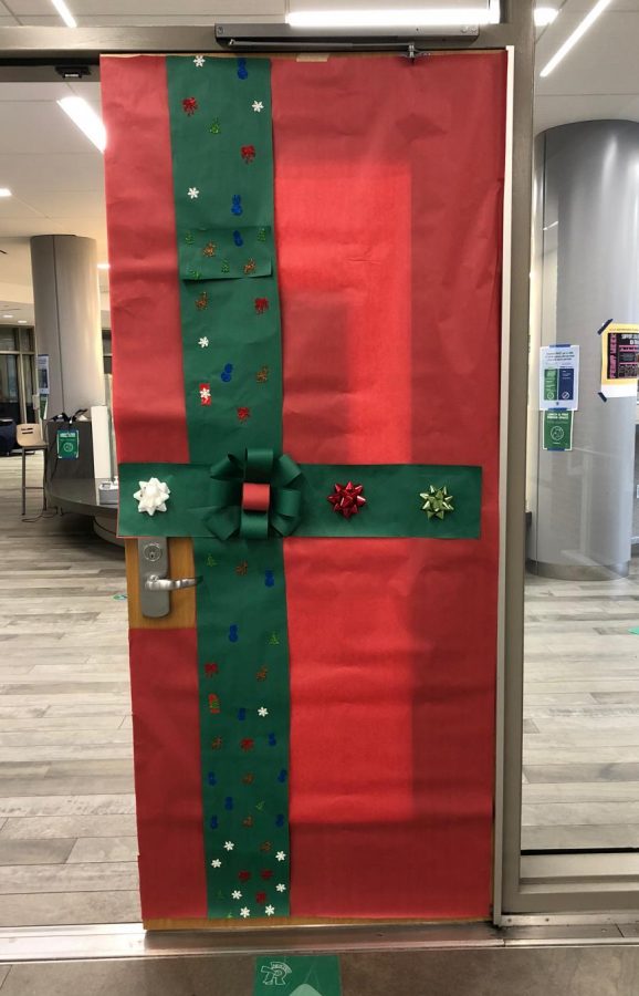 Doors around school, including this one to the library commons, were wrapped in holiday cheer in December by Transition Program students  