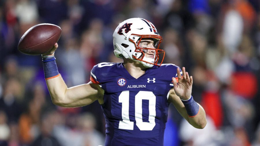 Auburn+quarterback+Bo+Nix+%2810%29+throws+a+pass+during+the+first+half+of+an+NCAA+college+football+game+against+Mississippi+Saturday%2C+Oct.+30%2C+2021+in+Auburn%2C+Ala.+%28AP+Photo%2FButch+Dill%29