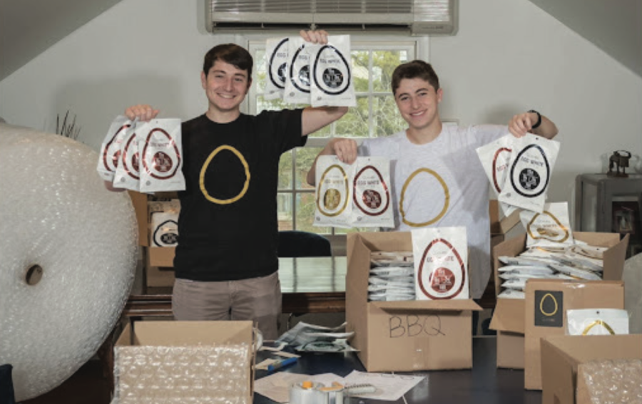 Co-founders+Nick+Hamburger+and+Zack+Shrier+display+product+of+the+egg-white+based+chip+company+they+created%2C+Quevos