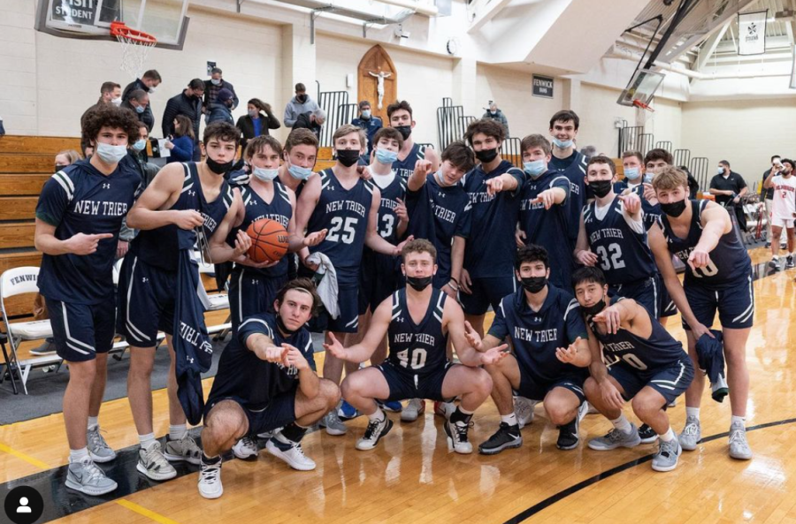 The+New+Trier+varsity+boys+basketball+team%2C+pictured%2C+has+led+a+remarkable+season+being+ranked+fourth+in+the+state+and+with+a+25-3+record