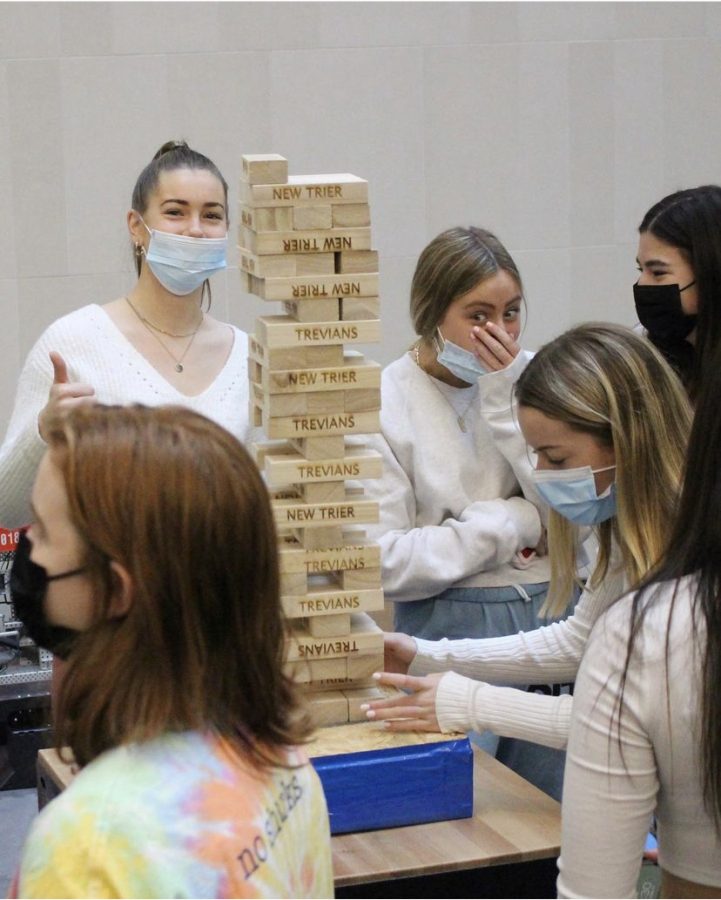 Students participate in Giant Jenga during advisery. Trevian games unites adviseries through good-natured and high-spirited competitions