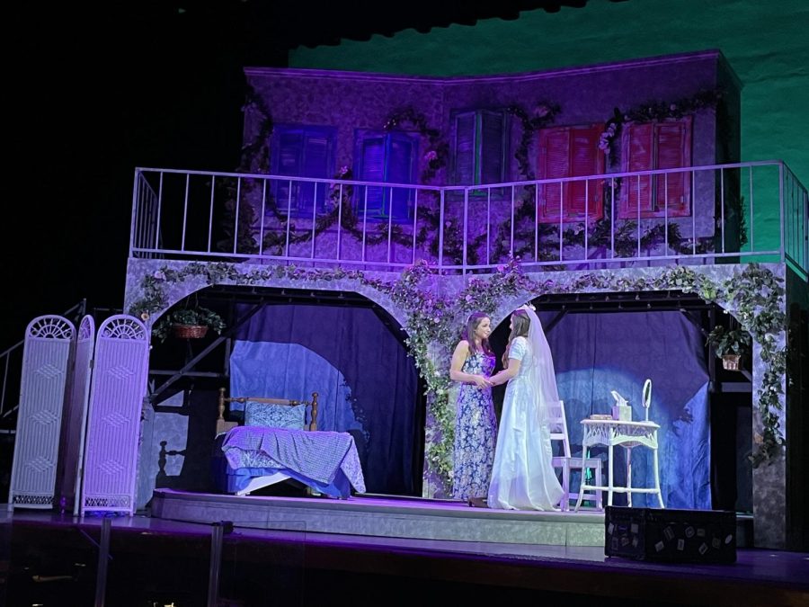 In the musical, Sophies mother Donna (Ericka Pugliese) embraces Sophie (Bella Friedman) as she prepares to get married