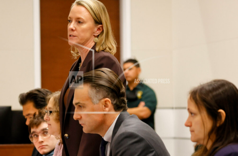 Assistant Public Defender Melissa McNeill introduces members of the defense team to jurors at the Broward County Courthouse on April 12, 2022
