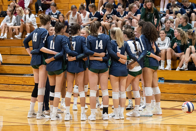 Girls+Volleyball+huddles+up+during+a+match+against+Loyola+on+Sept.+8.+The+girls+lost+in+three+sets+2-1+