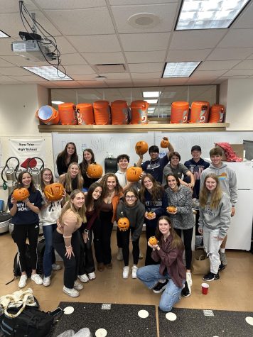 Sports med club members pose for a picture after this years annual pumpkin carving on Oct. 13
