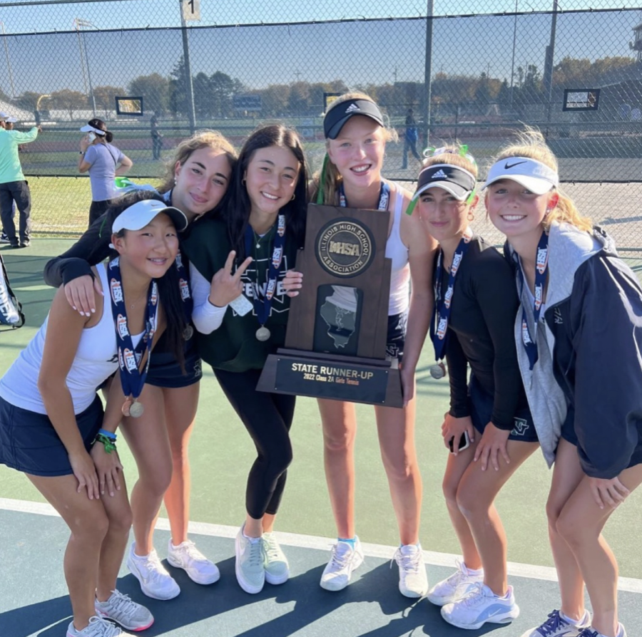 The+Girls+Varsity+tennis+team+poses+with+their+trophy+after+their+runner-up+finish+at+state+on+Oct.+22