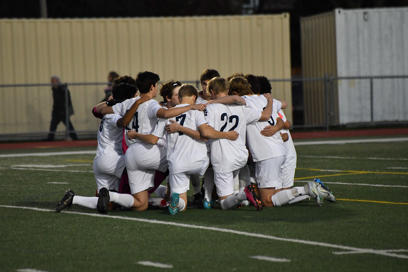 The+team+huddles+up+before+a+tough+double+overtime+loss+to+Stevenson+at+the+Hersey+soccer+field+1-0+on+Nov.+1%2C+2022