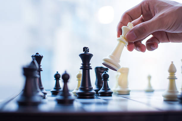 Online chess playing allows students to play against a human-like artificially intelligent opponent to practice and perform their abilities 