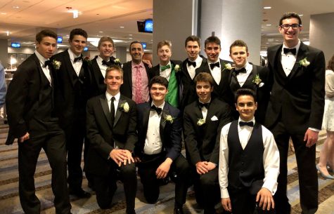 Mr. Trovato poses with his advisory during the 2019 prom at the Hyatt Regency. This prom will also be at the Hyatt Regency 6-10, and you have to get there before 7 and cannot leave until after 9.