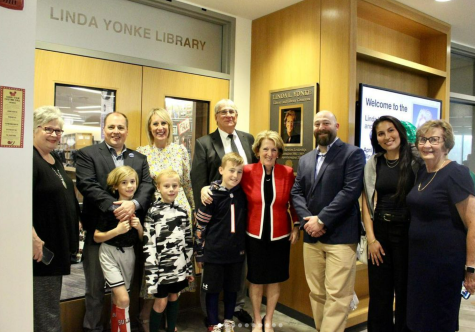 Former superintendent Linda Yonke with her family and friends at the dedication of the Linda Yonke Library and Commons on April 21