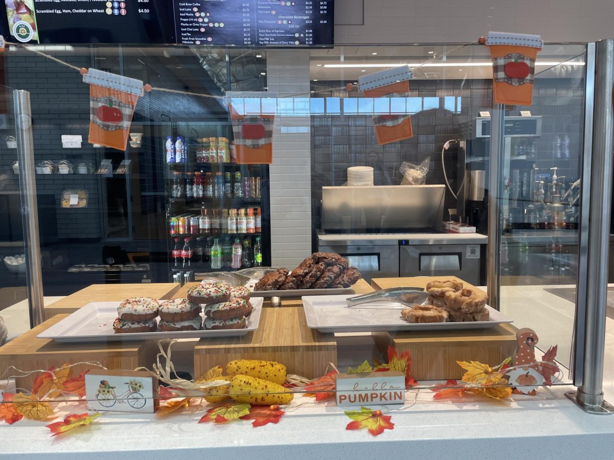 The new cafe is currently decorated for the fall season and features many offerings including donuts, bagels, and different kinds of drinks