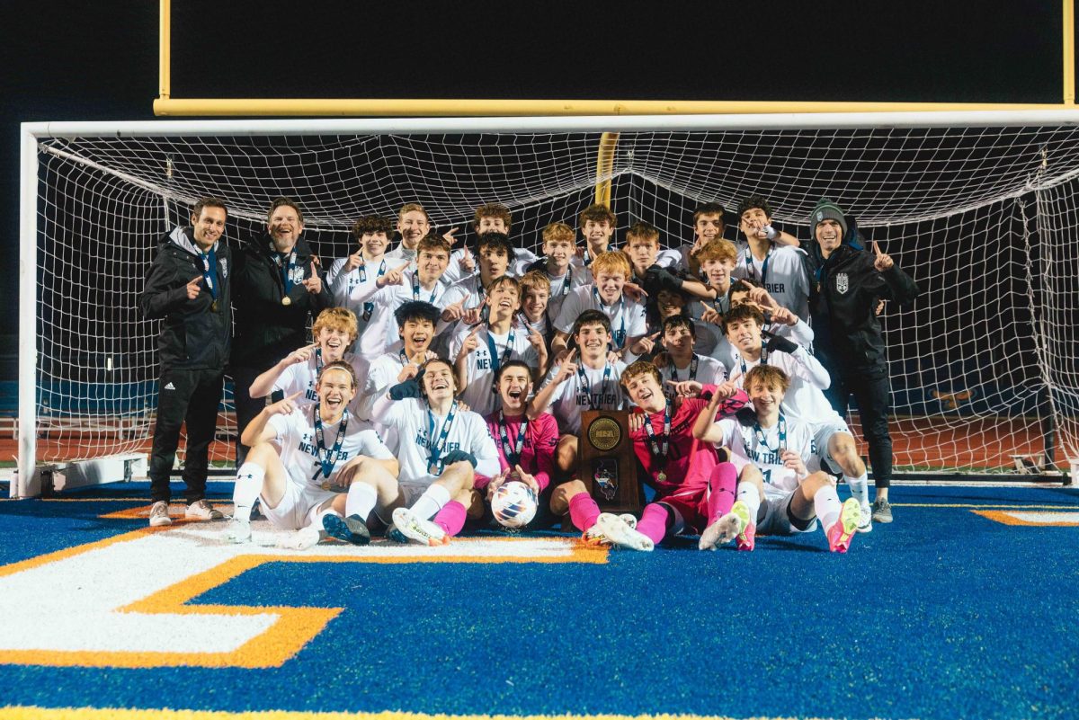 Boys+soccer+varsity+team+celebrates+after+defeating+Lyons+Township+in+soccer+3A+state+championship