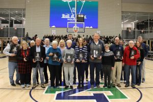 Hall of Honor inductees recognized in between New Trier basketball games on Feb. 2
