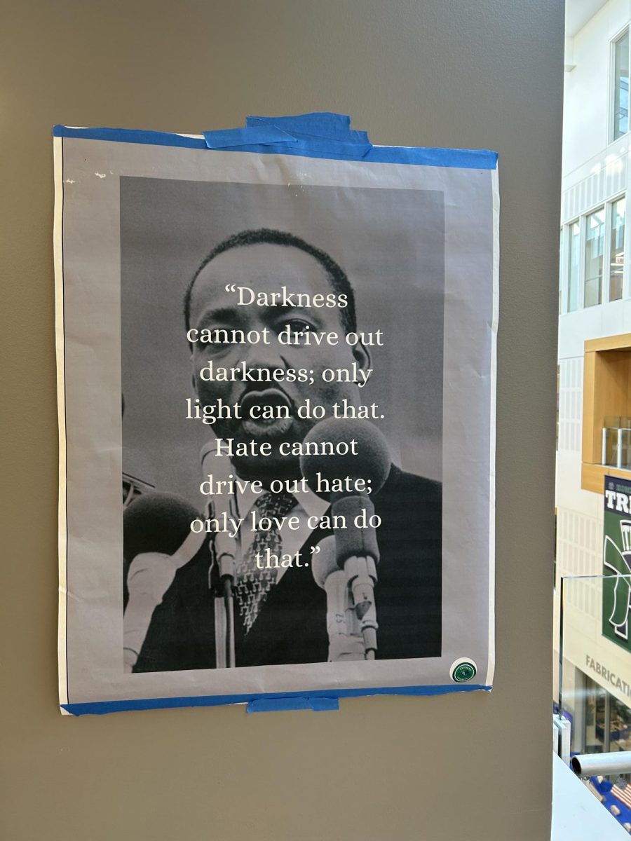 School administration put up posters of MLK around the school, each labeled with quotes related to civil rights
