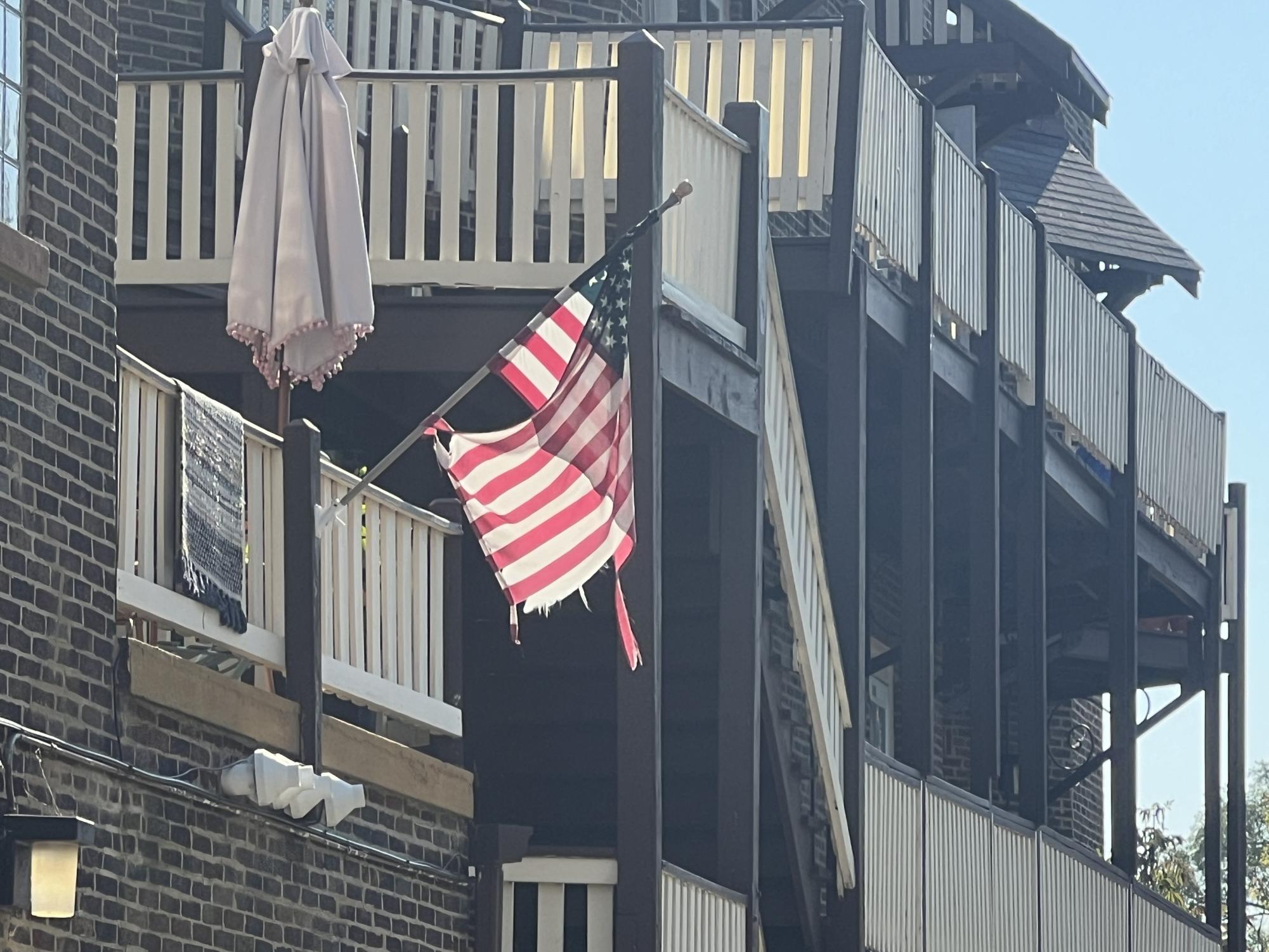 An American flag outside of a building on Winnetka Ave, near New Trier’s Winnetka Campus
