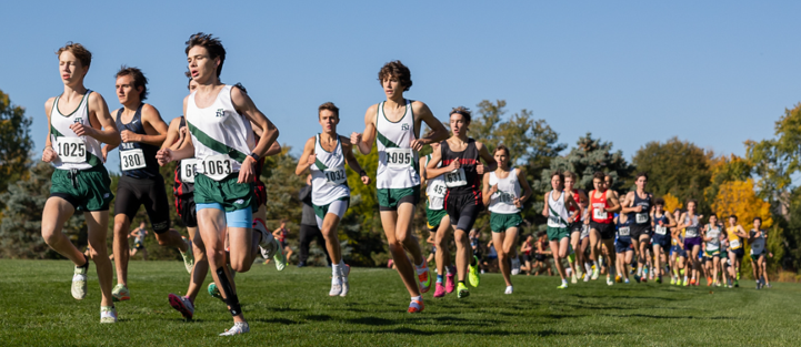 Boys cross country leading during a race last season