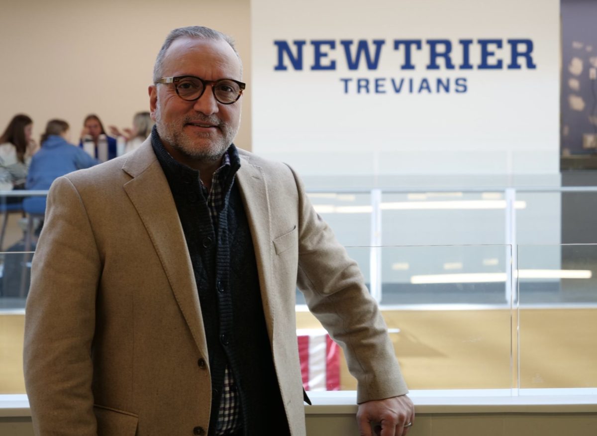 Incoming Superintendent Dr. Peter Tragos on the second floor in the concourse at New Trier's Winnetka Campus