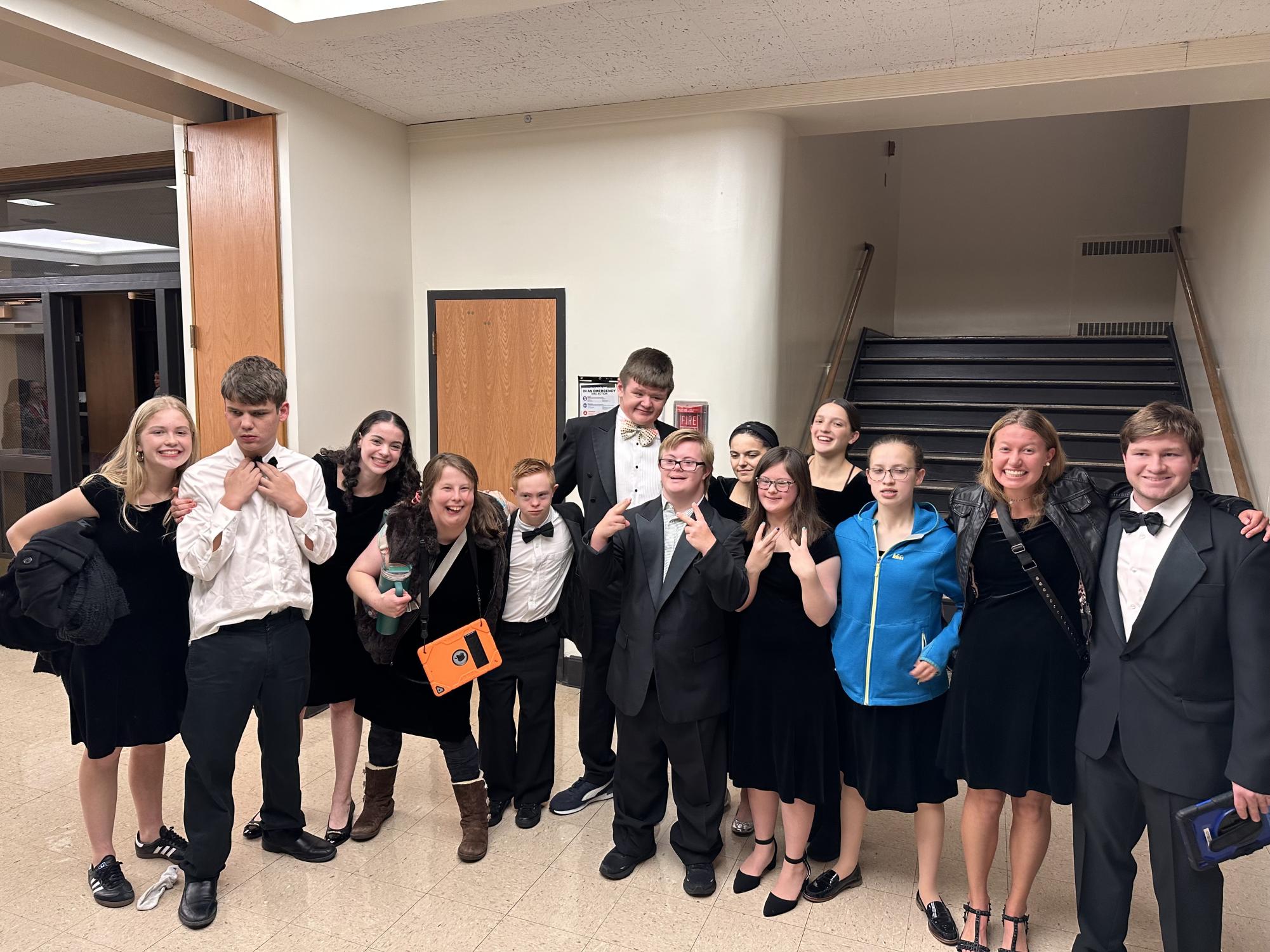 High Five Choir members outside the Gaffney Theatre at New Trier High School's Winnetka Campus