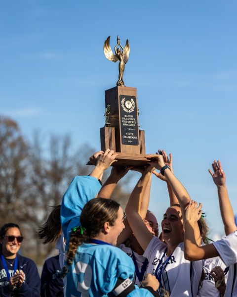 Girls field hockey team celebrate after winning state championship on Nov. 2, 2024