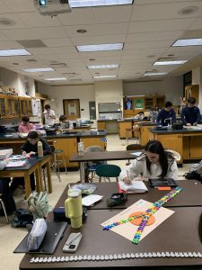 The current set up of the lab rooms with a lecture portion in the front and lab tables in the back