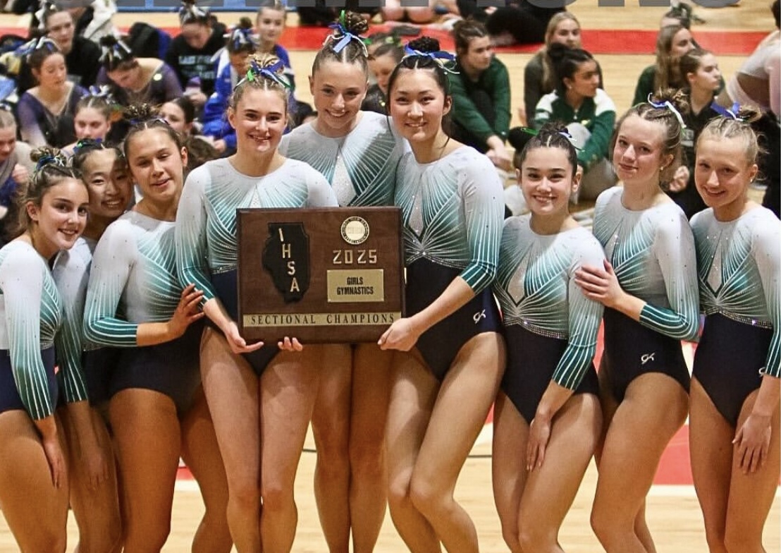 New Trier High School girls gymnastics team after winning sectionals, which took place on Feb. 13 at Mundelein High School.
