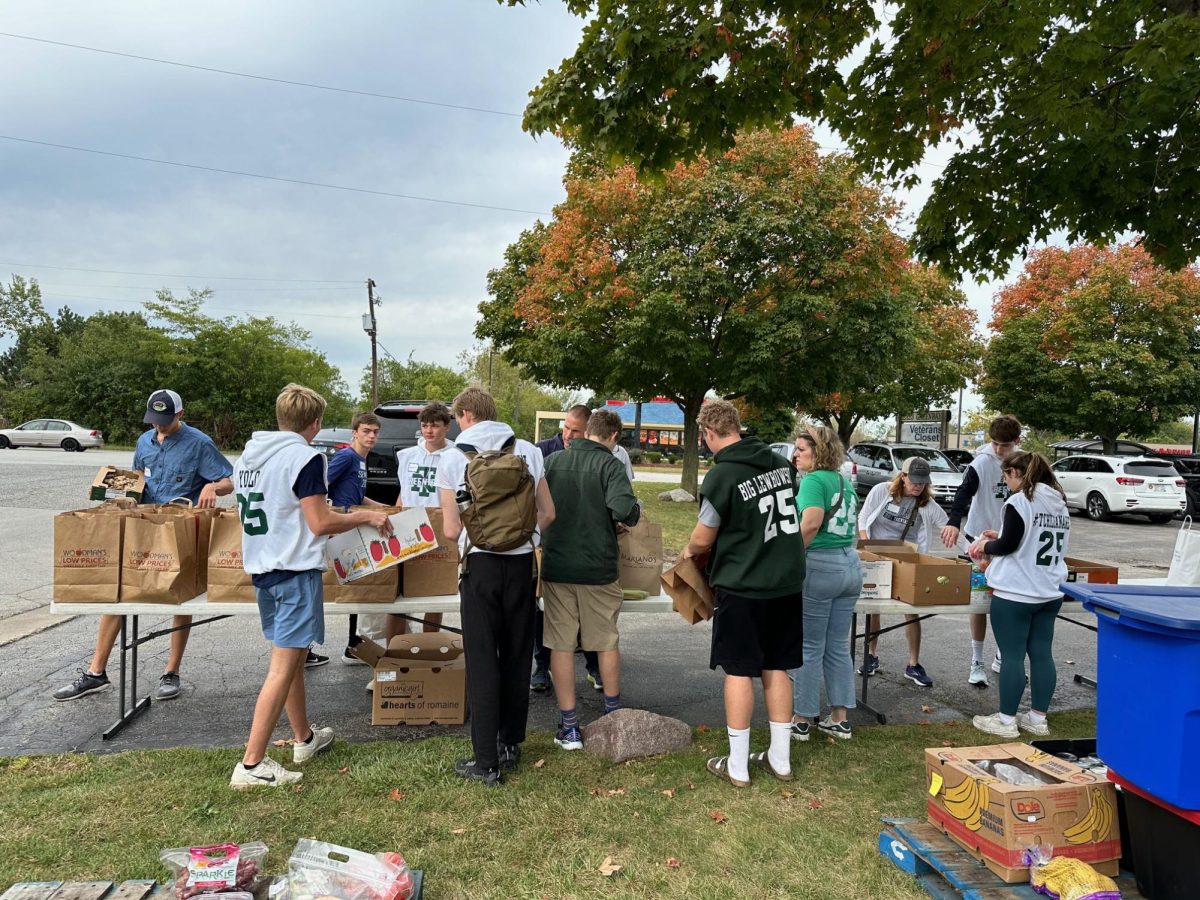 Seniors lead a food drive att the Midwest Veterans Closet