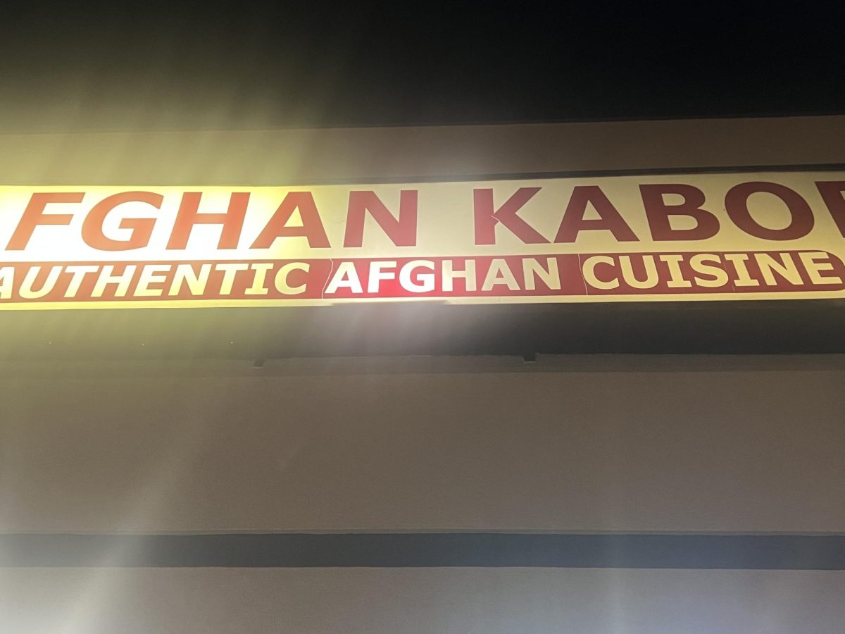 The glistening sign at night
