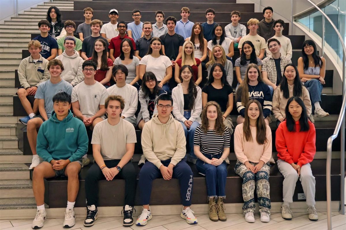 The 43 National Merit Scholarship semifinalists from New Trier. Back (fifth) row from left to right: Ethan He, John Bostrom, Eshan Nayak, Emmett Lin, Joshua Collins, Nicholas Furton, Charles Cohen, Cooper Cohen, and Nathan Kim; Fourth row from left to right: Benjamin Newman, Ariyel Rosen, Nick Steen, Ritvik Goyal, Aidan Jones, Aidan O'Brien, Ava Hudson, Sophia Zhao, Carter Dill, and Aiden Khanna; Third row from left to right: Blake O'Donnell, Nathaniel Gale, Julia Dale, Catherine Ji, Lola McBride, Chloe Schueller, Carolina Mangum, Nayana Kundu, Ethan Epstein, and Eila Kittikamron-Mora; Second row from left to right: James Bloom, William Gordon, Jacob Wong, Jasmine Horton, Vivian Chen, Elan Hao, Tara Maclachlan, and Yejin Yang; Front (first) row from left to right: Brayden Wu, Julian Chae, Matt Peng, Anna Sandler, Anyi Kesler, and Emily Hu