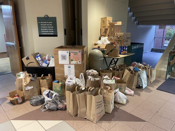 At the Community Recreation Center, bags are filled with items for the food drive
