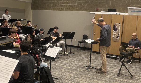 John Fedchock rehearses the trombone section during a Jazz Ensemble 1 class. 