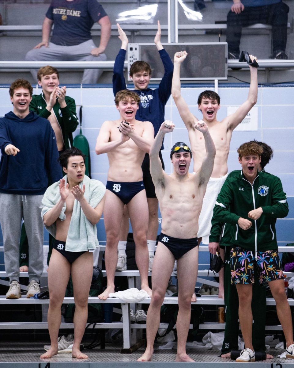 The team celebrates during their annual Trevian Relays on Jan. 17