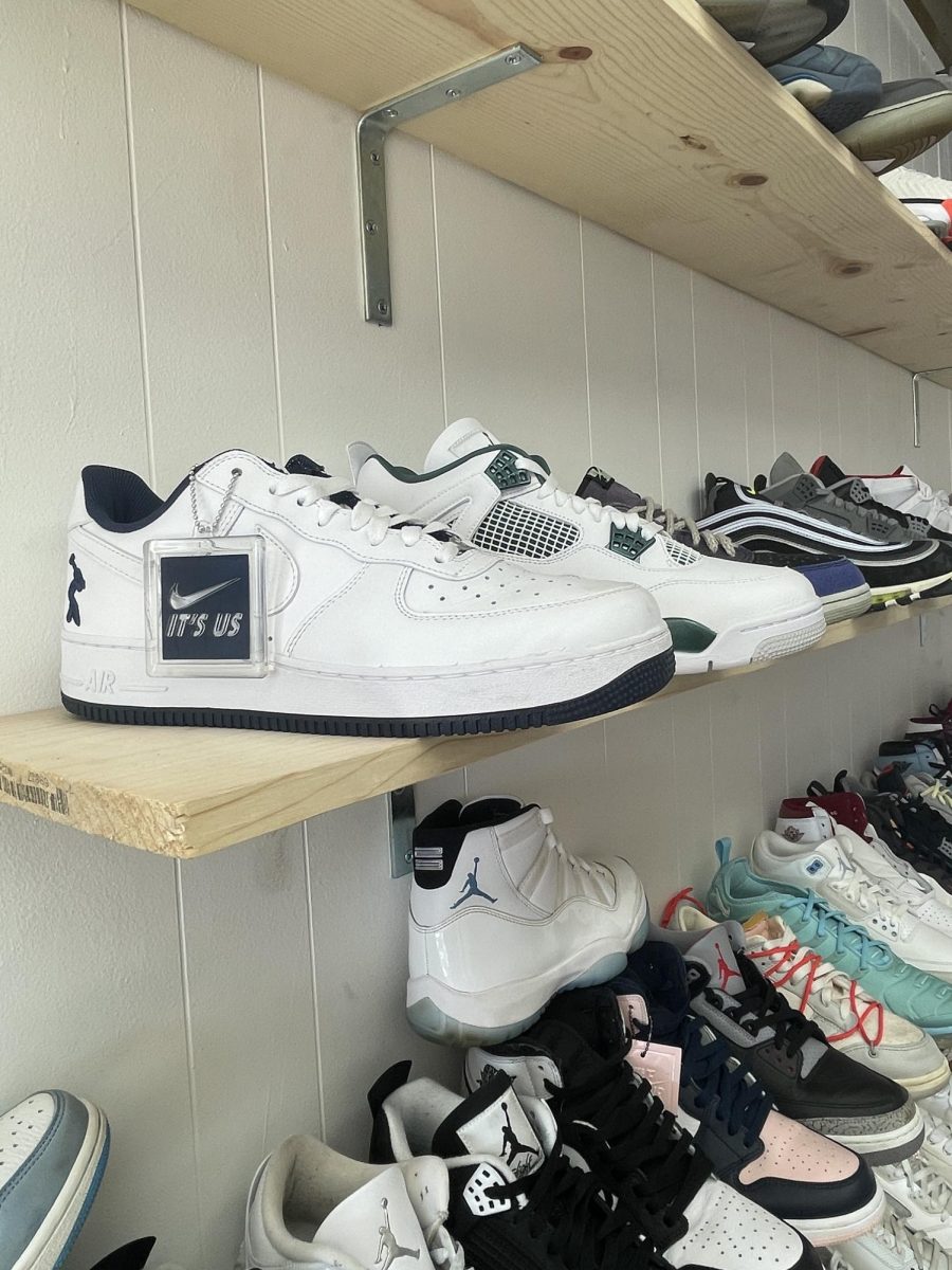 Nike Air Force 1s and other assorted sneakers adorn the walls of Stride Chicago